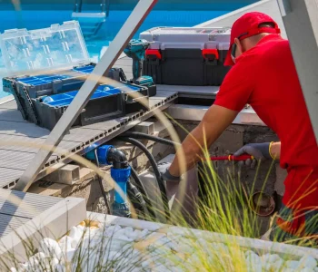 technician-fixing-swimming-pool-heating-system-2023-11-27-04-58-22-utc.jpg
